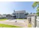 Spacious backyard with a covered patio, pool, and ample room for outdoor recreation and entertainment at 7372 Deerfield Dr, Greenfield, IN 46140