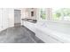 Primary bath features a soaking tub, dual sinks, and ample storage at 7372 Deerfield Dr, Greenfield, IN 46140