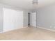 Spacious bedroom with closet, doorway, and chandelier light fixture at 7372 Deerfield Dr, Greenfield, IN 46140