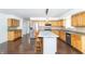 Well-lit kitchen featuring stainless steel appliances, center island, and ample cabinetry at 7372 Deerfield Dr, Greenfield, IN 46140