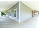Inviting wrap-around porch offers outdoor living space, with stone accents at 7372 Deerfield Dr, Greenfield, IN 46140