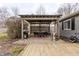 Outdoor patio with a pergola, grill, dining table, heater, and comfortable seating arrangement at 7806 Meadowbrook Dr, Indianapolis, IN 46240
