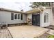 Inviting backyard with a wooden deck, gray siding, a small garden area and brick accents at 7806 Meadowbrook Dr, Indianapolis, IN 46240