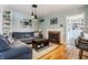 Cozy living room features a fireplace, comfortable seating, and stylish decor at 7806 Meadowbrook Dr, Indianapolis, IN 46240