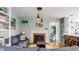 Cozy living room features a fireplace, comfortable seating, and stylish decor at 7806 Meadowbrook Dr, Indianapolis, IN 46240