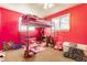 This pink bedroom features a lofted bed, a window, and carpet flooring at 7939 Sharon Dr, Avon, IN 46123