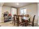 Bright dining area with modern flooring and an adjacent storage closet for ample storage at 7939 Sharon Dr, Avon, IN 46123