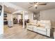 Spacious, naturally lit open-concept living room and dining area with modern flooring at 7939 Sharon Dr, Avon, IN 46123