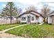 Charming single-story home with a well-maintained lawn and inviting curb appeal at 805 N Tuxedo St, Indianapolis, IN 46201
