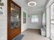 Bright, airy sun room with natural light, and white plank walls at 805 N Tuxedo St, Indianapolis, IN 46201