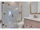 Elegant bathroom featuring a glass-enclosed shower, decorative tile, and modern vanity at 8146 W 875 S, Pendleton, IN 46064