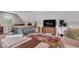 A cozy bedroom featuring a comfortable bed, an area rug and natural lighting from the window at 8146 W 875 S, Pendleton, IN 46064