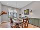 Bright dining room with large window featuring charming decor and ample space at 8146 W 875 S, Pendleton, IN 46064
