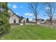 Spacious lawn featuring a two-story home and well-maintained landscaping at 8146 W 875 S, Pendleton, IN 46064