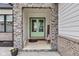 Covered front door featuring stone archway at 8146 W 875 S, Pendleton, IN 46064