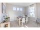 Dining room with lots of natural light and a modern table and chairs at 8710 Hollander Dr, Camby, IN 46113