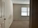 Bright bedroom featuring a window that provides ample natural light at 9452 Maple Way, Indianapolis, IN 46268