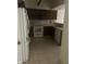 Functional kitchen featuring a white refrigerator and appliances, paired with dark wood cabinetry for a timeless aesthetic at 9452 Maple Way, Indianapolis, IN 46268