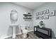 Bathroom with a pedestal sink and modern decorations at 10155 Pepper Tree Ln, Noblesville, IN 46060
