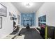 Home gym with fitness equipment and ample workout space at 10155 Pepper Tree Ln, Noblesville, IN 46060