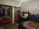 Bedroom featuring a themed comforter, a closet, and a mountain scene painted on the wall at 1016 Alden Dr, Fortville, IN 46040