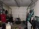 Spacious garage offering ample storage and parking space for vehicles and equipment at 1016 Alden Dr, Fortville, IN 46040