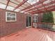 Brick home's spacious back deck with pergola offering a relaxing outdoor space at 10343 Waveland Cir, Fishers, IN 46038
