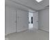 Finished carpeted basement with two doors and neutral paint perfect for a rec room or playroom at 10343 Waveland Cir, Fishers, IN 46038