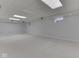 Finished basement offers carpeted flooring, recessed lighting, egress window, and neutral walls at 10343 Waveland Cir, Fishers, IN 46038