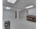 A spacious finished basement featuring carpet and a musical instrument at 10343 Waveland Cir, Fishers, IN 46038