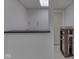 Finished basement features built-in bar area with a door leading to another room at 10343 Waveland Cir, Fishers, IN 46038