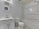 Updated bathroom features a shower-tub combo and single sink vanity with a framed mirror at 10343 Waveland Cir, Fishers, IN 46038