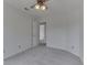 Bedroom featuring carpet, a door to another room and ceiling fan with lights at 10343 Waveland Cir, Fishers, IN 46038