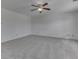 Spacious bedroom with ceiling fan and neutral carpet at 10343 Waveland Cir, Fishers, IN 46038