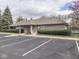 A well-maintained community clubhouse with ample parking, professional landscaping, and inviting entrance at 10343 Waveland Cir, Fishers, IN 46038