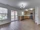 Spacious kitchen features stainless steel appliances, wood cabinets, and a sliding door to the deck at 10343 Waveland Cir, Fishers, IN 46038