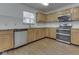 Kitchen features granite countertops, a window with a view, and stainless steel appliances at 10343 Waveland Cir, Fishers, IN 46038