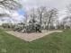 A charming community playground with slides, swings and climbing areas provides Gathering fun at 10343 Waveland Cir, Fishers, IN 46038