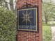 A brick pillar featuring the Northpoint neighborhood sign, surrounded by lush greenery and trees at 10343 Waveland Cir, Fishers, IN 46038