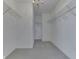 Large walk-in closet with ample shelving and carpet flooring at 10343 Waveland Cir, Fishers, IN 46038