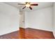 Spacious bedroom featuring gleaming hardwood floors and a modern ceiling fan with light at 1086 Meadowview Ct, Franklin, IN 46131