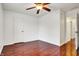 Bedroom featuring hardwood floors, a ceiling fan, and white walls at 1086 Meadowview Ct, Franklin, IN 46131