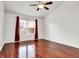 Comfortable bedroom with hardwood floors and a ceiling fan at 1086 Meadowview Ct, Franklin, IN 46131