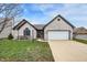 Charming single-story home with a brick facade, attached garage, and well-maintained lawn and landscaping at 1086 Meadowview Ct, Franklin, IN 46131