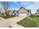 This property features a well-manicured lawn, a two-car garage, and a charming brick facade at 1086 Meadowview Ct, Franklin, IN 46131