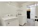 Laundry room with modern washer and dryer units at 1086 Meadowview Ct, Franklin, IN 46131