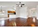 Open living space featuring hardwood floors, a view of the kitchen, and a bright entryway at 1086 Meadowview Ct, Franklin, IN 46131
