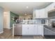 Well-equipped kitchen with stainless steel appliances and ample counter space at 10946 Snowdrop Way, Indianapolis, IN 46235