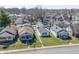 Neighborhood aerial view showcasing the homes, mature trees, and the surrounding community at 1135 E Southern Ave, Indianapolis, IN 46203