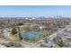 Scenic aerial view of the community featuring a park with tennis courts and downtown skyline views at 1135 E Southern Ave, Indianapolis, IN 46203